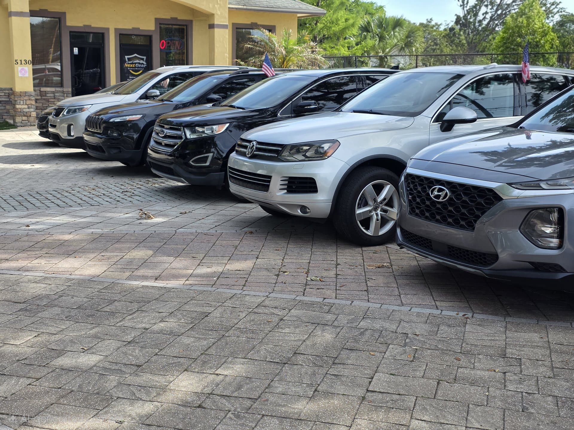 Next Gear Remarketing lot at 5130 Old Winter Garden Rd, Orlando, FL — pre-owned vehicle inventory